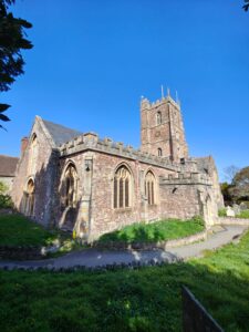 Church, showing tower, Nave and southern entrance