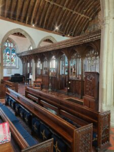 Screen stretching across church