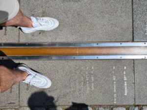 Standing over the Meridian Line