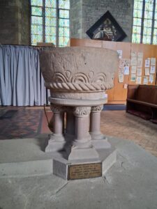 The medieval font dating from the 12th century